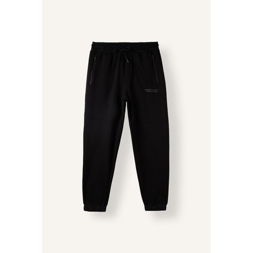 Pantalon long à taille élastique avec poches zippées Coupe régulière