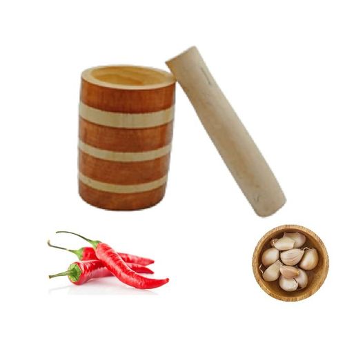 Le pilon en bois,utilisé pour broyer ou mélanger,ail, piment...