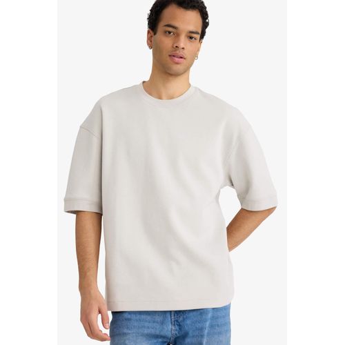 تيشيرت نص كم قصة فضفاضة برقبة مستديرة