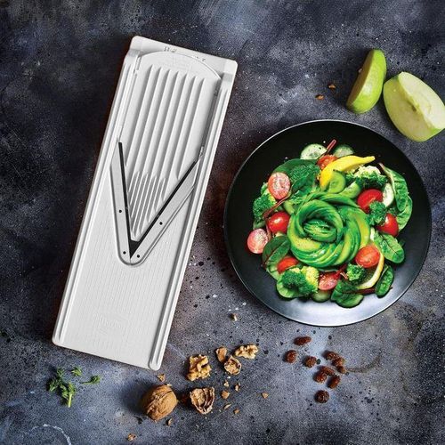 This image shows a multi-function mandoline vegetable slicer.