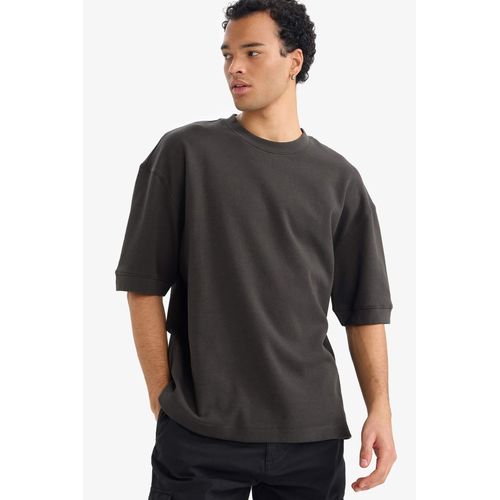 تيشيرت نص كم قصة فضفاضة برقبة مستديرة