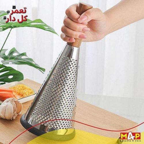 Râpe à fromage et à légumes avec poignée ergonomique.