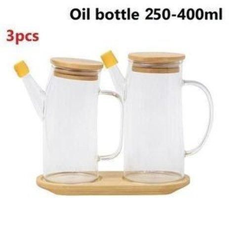 Lot de 2 Bouteilles distributrices d'huile en verre avec bec verseur et poignée, conception anti-fuite avec support en bambou