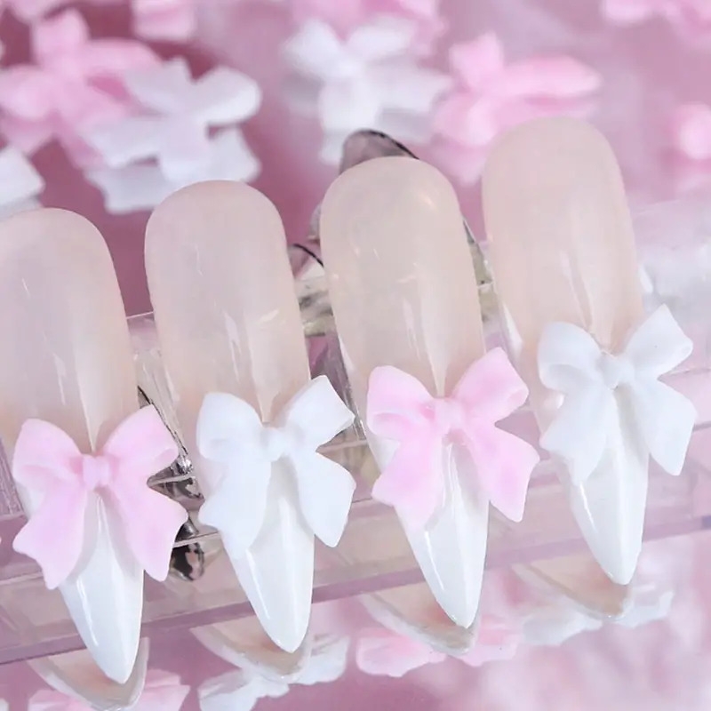 50/100pcs Breloques 3D nœud papillon pour Nail Art, Mélange Rose & Blanc, Accessoires Mignons pour Nail Art DIY, Décoration de Bijoux en Résine Douce pour Bricolage détails 1