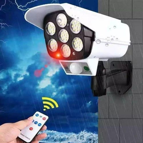 Fausse caméra de sécurité solaire avec projecteur LED d'extérieur étanche avec télécommande et détecteur de mouvement.