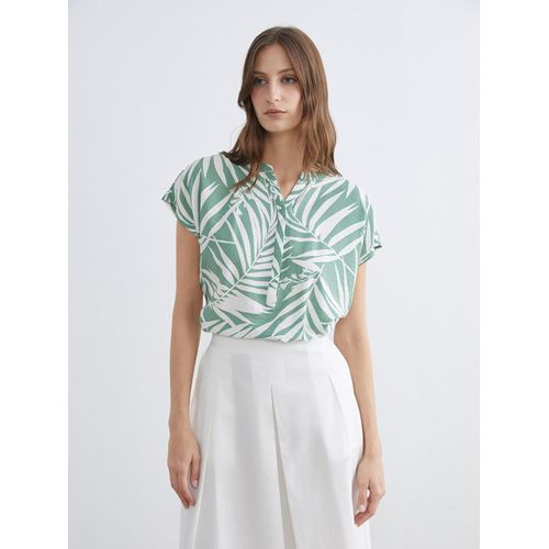 Blouse à motifs avec encolure en V échancré
