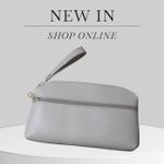 product_image_name-Generic-Trousse de Maquillage Beige Élégante en Cuir PU - Pochette Cosmétique Double Zip avec Dragonne - Compacte & Pratique-1