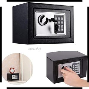 Coffre-fort électronique compact avec clavier numérique et clés de secours, dimensions 23 x 17 x 17 cm.