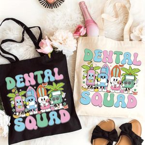 Sac fourre-tout Dental Squad - Design amusant avec des personnages de dessin animé à dents, grand sac à bandoulière durable pour les voyages, les achats et les pique-niques, blanc avec impression colorée, sac dentaire
