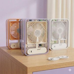 Mini ventilateur de bureau rechargeable au design minimaliste et translucide, silencieux et portable, idéal pour une utilisation au bureau ou à la maison.