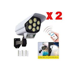 pack 2 lampes solaires capteur de mouvement extérieur caméra factice :)