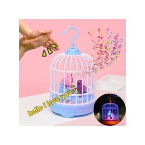 Jouet de cage à oiseaux chantants, sons réalistes, mouvement, jouet d'oiseau lumineux, figurine d'oiseau pour enfants, jouet de gazouillis activé par le son, décoration à suspendre avec lumière.