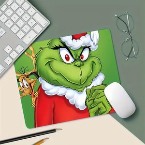 Tapis de souris de Noël au fond vert fantaisiste, avec une base antidérapante, idéal pour le bureau, les études et les jeux, portable et durable, ce qui en fait un excellent accessoire de bureau.