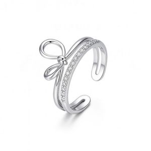 Bague à nœud papillon double couche argentée en acier inoxydable 304