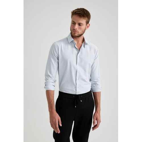 Defacto Chemise a manches longues en tissu tisse a encolure polo a coupe slim pour homme Bleu a prix pas cher Jumia Maroc
