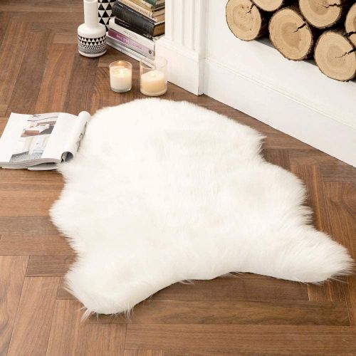 Tapis blanc fourrure