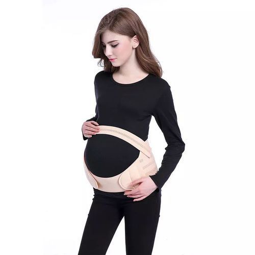 Ventre De Femme Enceinte Dans La Ceinture De Maternité De