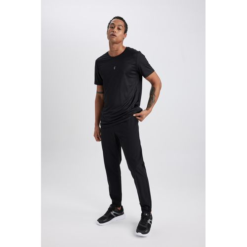 Jogging tissé homme outlet