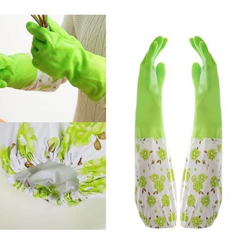 Gants De Protection En Tissu De Vaisselle De Cuisine Sur Une Surface  Blanche