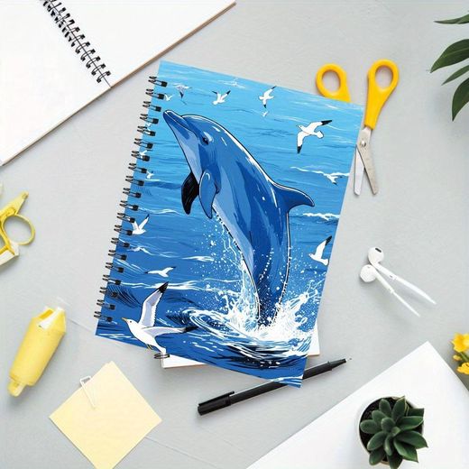 Bloc-notes, A5, 13.97*21.08 cm, 50 pages, Présentant un dauphin sautant de avec des goélands, dans un style illu