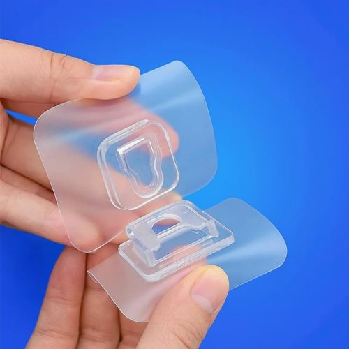 Crochet adhésif transparent double face mural sans perçage fixation solide réutilisable rangement maison cuisine.